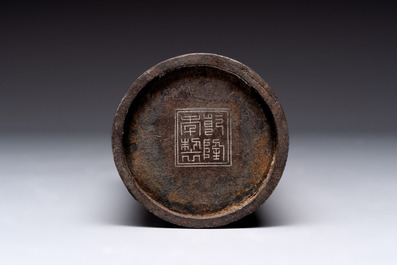 A Chinese bronze tripod censer with cover and stand, a small tripod censer and a silver-inlaid iron brush pot, 19/20th C.