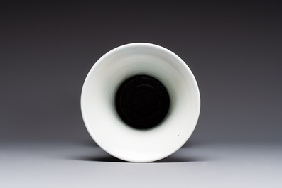 A Chinese blue, white and copper-red 'Liuhai' 'yenyen' vase, Kangxi