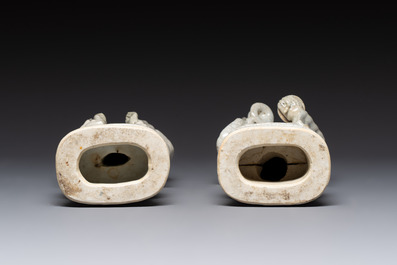 A pair of Chinese blue and white crackle-glazed monks, 19th C.