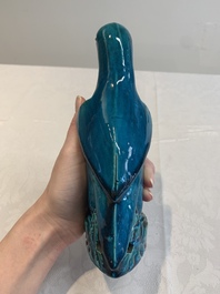 A pair of Chinese turquoise-glazed parrots, 19th C.