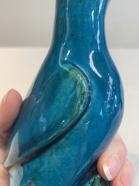 A pair of Chinese turquoise-glazed parrots, 19th C.