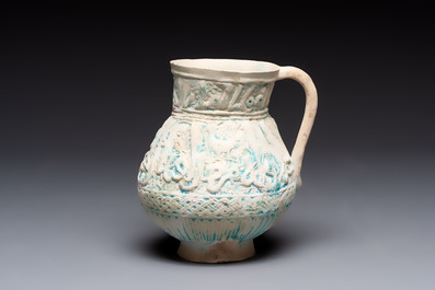 A green-glazed and a turquoise-glazed Kashan jug, Persia, 12/13th C.
