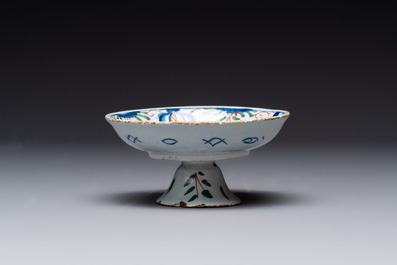 A collection of eight polychrome, blue and white Dutch Delftwares, 18/19th C.