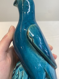 A pair of Chinese turquoise-glazed parrots, 19th C.