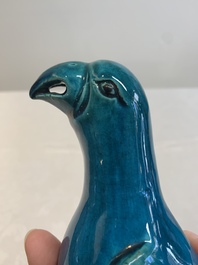 A pair of Chinese turquoise-glazed parrots, 19th C.