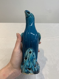 A pair of Chinese turquoise-glazed parrots, 19th C.