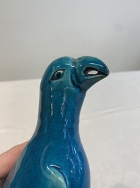 A pair of Chinese turquoise-glazed parrots, 19th C.