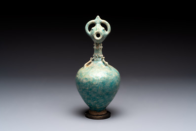 A green-glazed and a turquoise-glazed Kashan jug, Persia, 12/13th C.