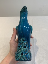 A pair of Chinese turquoise-glazed parrots, 19th C.