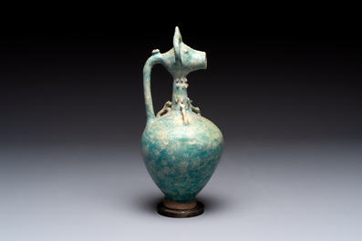 A green-glazed and a turquoise-glazed Kashan jug, Persia, 12/13th C.