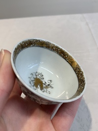 A fine Chinese grisaille and gilt '18 Luohan' cup and saucer, Yongzheng