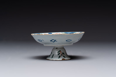 A collection of eight polychrome, blue and white Dutch Delftwares, 18/19th C.