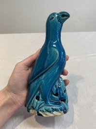 A pair of Chinese turquoise-glazed parrots, 19th C.