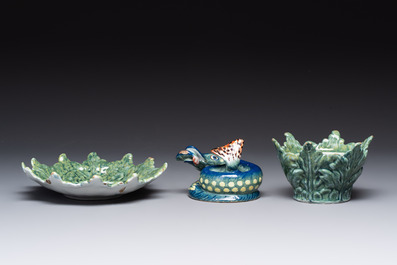A rare polychrome Dutch Delft pike tureen and cover on stand, 18th C.