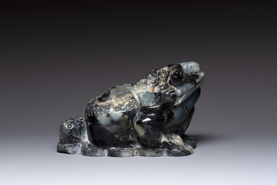 A Chinese jade group of an imperial carriage with mythical beasts and a large three-legged toad, 20th C.