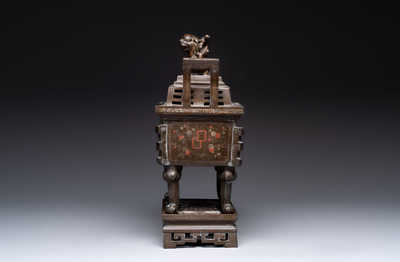 A large Vietnamese copper- and silver-inlaid rectangular 'Buddhist lion' censer and cover on stand, 19th C.