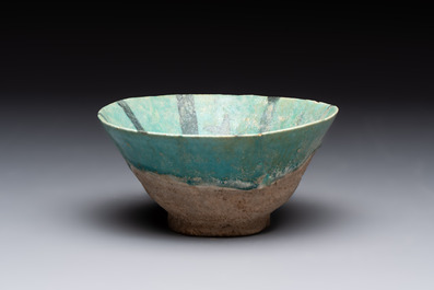 A turquoise-glazed calligraphic dish and a bowl, Kashan, 13/14th C.