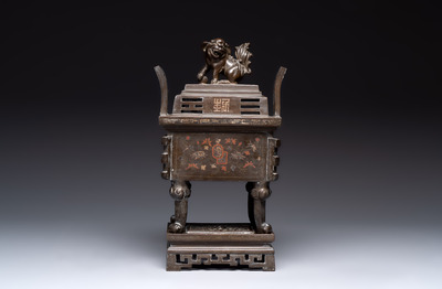 A large Vietnamese copper- and silver-inlaid rectangular 'Buddhist lion' censer and cover on stand, 19th C.