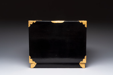 A rare Japanese black-lacquered cabinet with finely engraved gilt mounts, Edo, late 17th C.