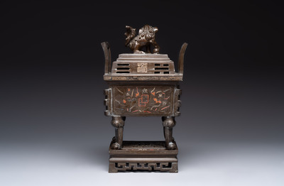 A large Vietnamese copper- and silver-inlaid rectangular 'Buddhist lion' censer and cover on stand, 19th C.