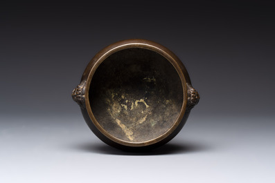 A Chinese bronze censer with lion-form handles, 大明宣德五年監造工部官監吳邦佐造 mark, 18th C.