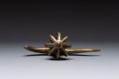 A Tibetan brass and iron kartika with incised dragon design, 19th C.