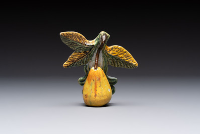 A collection of six polychrome Dutch Delft hanging fruits, 18th C.