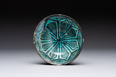 Two turquoise-and-black-glazed bowls, Kashan, 13/14th C.