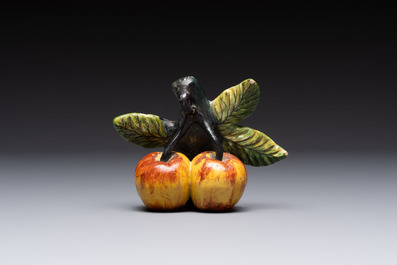 A collection of six polychrome Dutch Delft hanging fruits, 18th C.