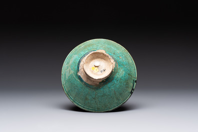 Two turquoise-and-black-glazed bowls, Kashan, 13/14th C.