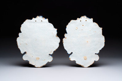 A pair of polychrome Dutch Delft mixed technique 'flower vase' plaques, ca. 1750