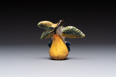 A collection of six polychrome Dutch Delft hanging fruits, 18th C.