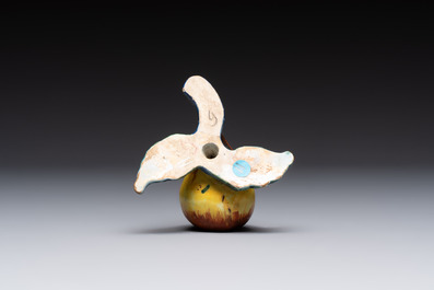 A collection of six polychrome Dutch Delft hanging fruits, 18th C.