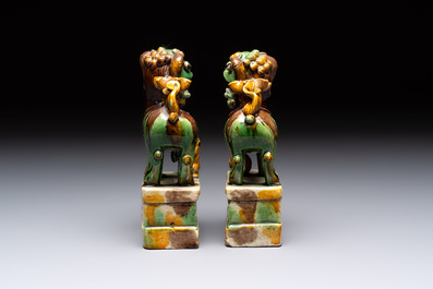A pair of Chinese sancai-glazed Buddhist lions and an inkwell, 19th C.