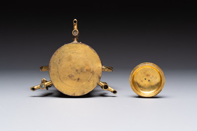 A rare and fine Chinese partly-gilt copper chocolate pot with tripod stand, 18th C.