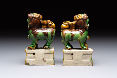 A pair of Chinese sancai-glazed Buddhist lions and an inkwell, 19th C.