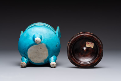A Chinese turquoise-glazed tripod censer with wooden cover, Ming