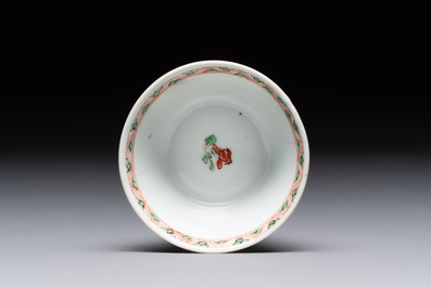 A Chinese famille verte 'erotic' cup and saucer, lingzhi mark, Kangxi
