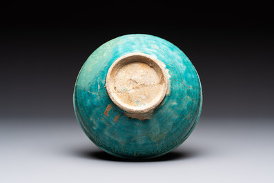 Two turquoise-glazed calligraphic bowls, Kashan, 13/14th C.