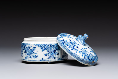 A small blue and white Dutch Delft tureen and cover with a foal finial, 18th C.