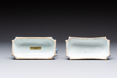A pair of blue and white Dutch Delft prancing horses on a green-glazed base, 18th C.