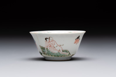 A Chinese famille verte 'erotic' cup and saucer, lingzhi mark, Kangxi