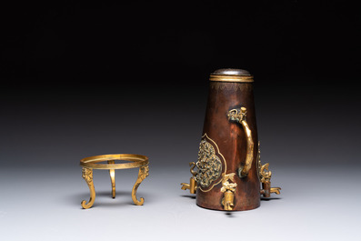 A rare and fine Chinese partly-gilt copper chocolate pot with tripod stand, 18th C.