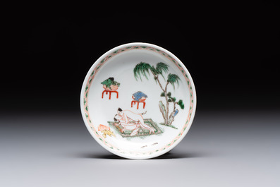 A Chinese famille verte 'erotic' cup and saucer, lingzhi mark, Kangxi