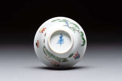 A Chinese famille verte 'erotic' cup and saucer, lingzhi mark, Kangxi