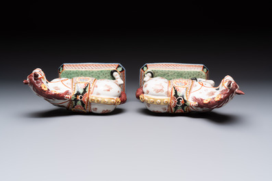 A pair of polychrome and gilt-decorated Dutch Delft petit feu horses, 18th C.