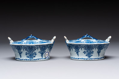 A pair of blue and white Dutch Delft butter tubs and covers, 18th C.