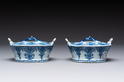A pair of blue and white Dutch Delft butter tubs and covers, 18th C.