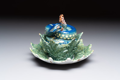 A rare polychrome Dutch Delft pike tureen and cover on stand, 18th C.