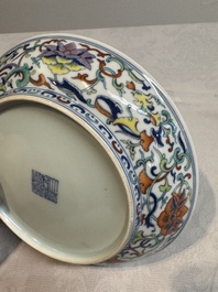 A Chinese doucai 'phoenix and lotus scroll' plate, Qianlong mark and of the period